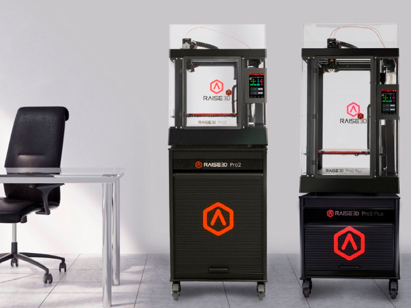 A working space with the Raise 3D pedestal printers carts